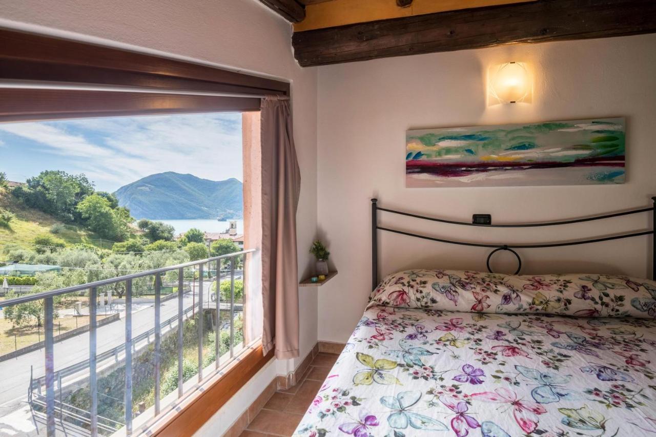 Mansarda Con Vista Lago Sulzano Kültér fotó